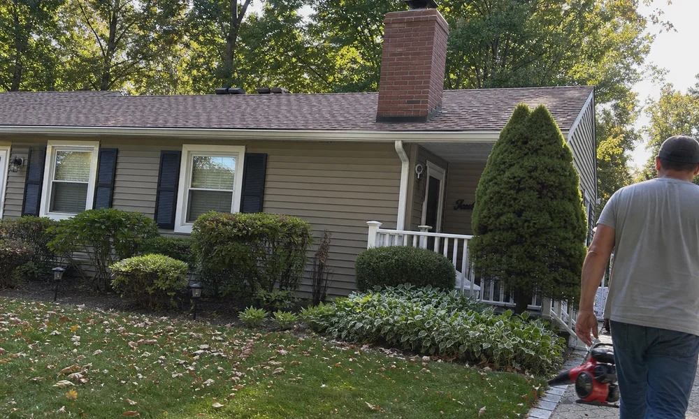 Finished chimney with a clean roof, gutters, and lawn after white-glove cleanup