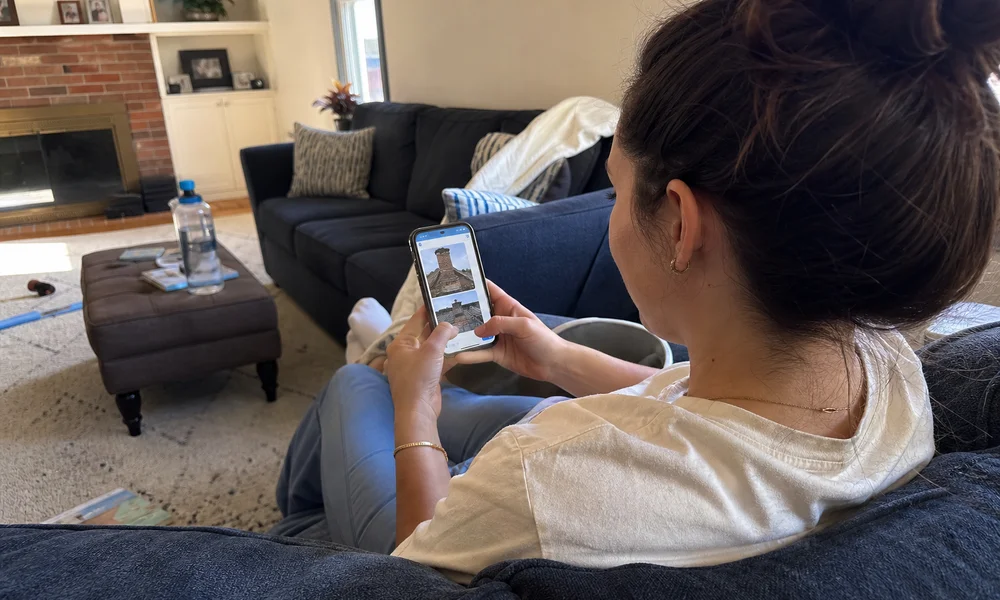 Homeowner texting chimney photos to West Hartford Chimney Repair