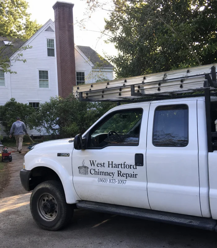 West Hartford Chimney Repair branded service truck parked outside a Connecticut home